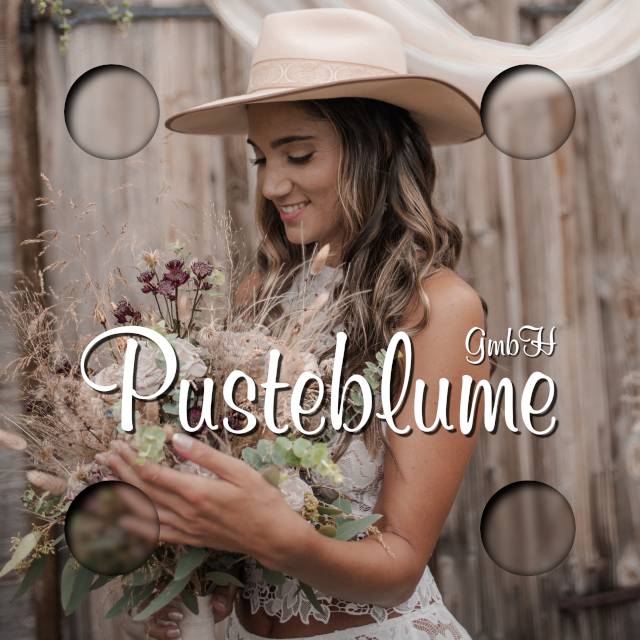 schöne Braut mit Blumenstrauss und weissem Hut